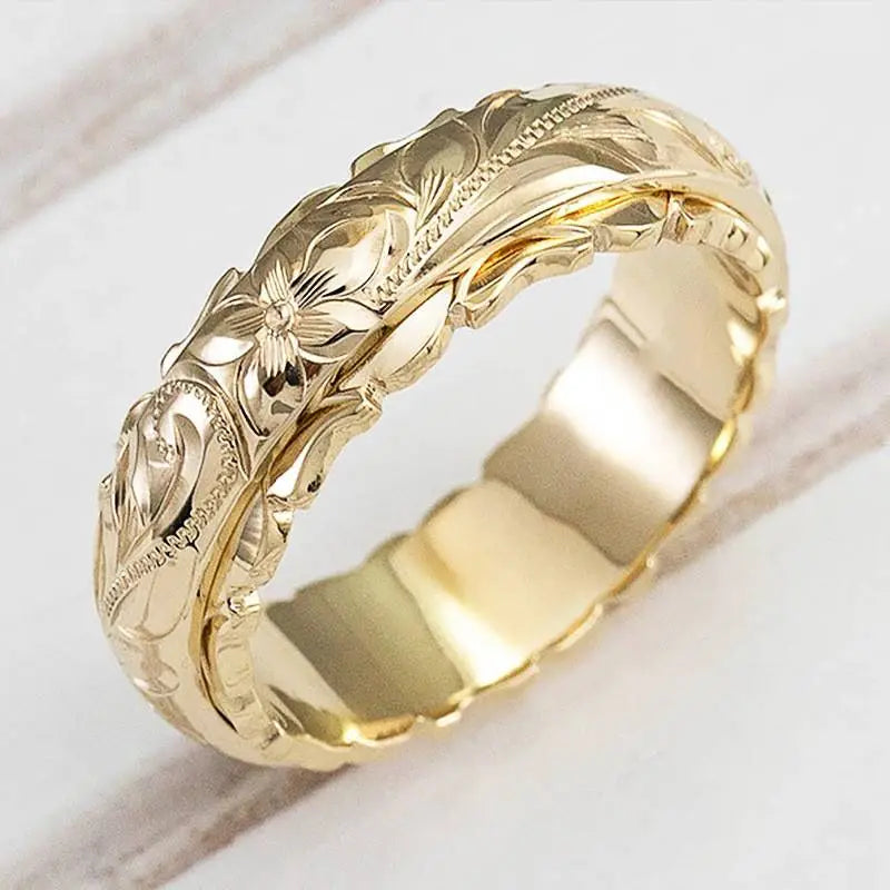 Mila – Guldring med blomst inspireret af antikken